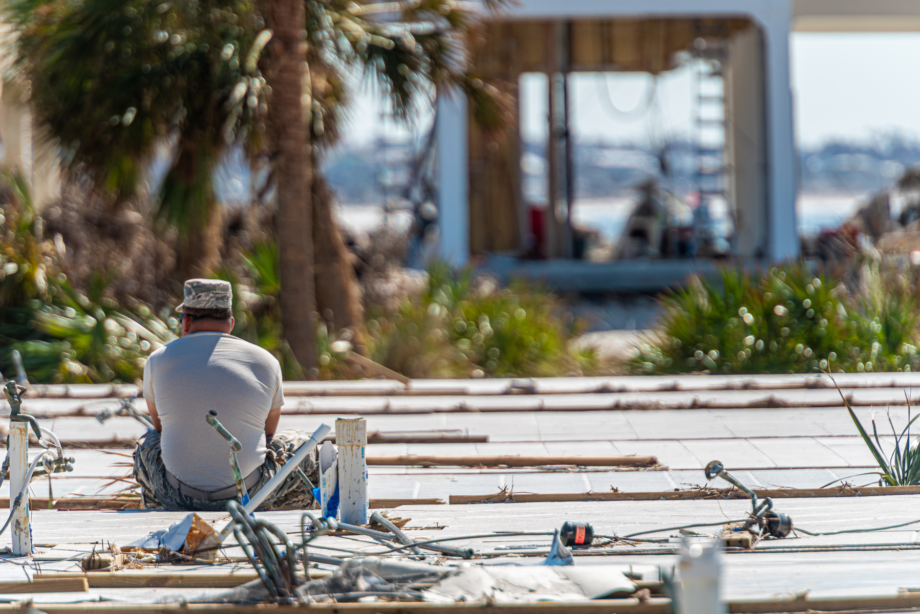 October 18, 2018 - Mexico Beach, FL - A rescue worker rest in between searches for survivors from the aftermath of Hurricane Michael in Mexico Beach, Florida, on October 11, 2018.. The strongest storm on record to ever make landfall in Northwest Florida, and the fourth most powerful to ever hit the continental United States.