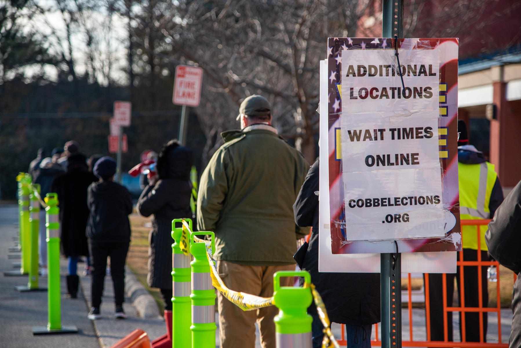 December 17, 2020. - Marietta, GA. Hundreds of people wait in line for early voting in Marietta, Ga.